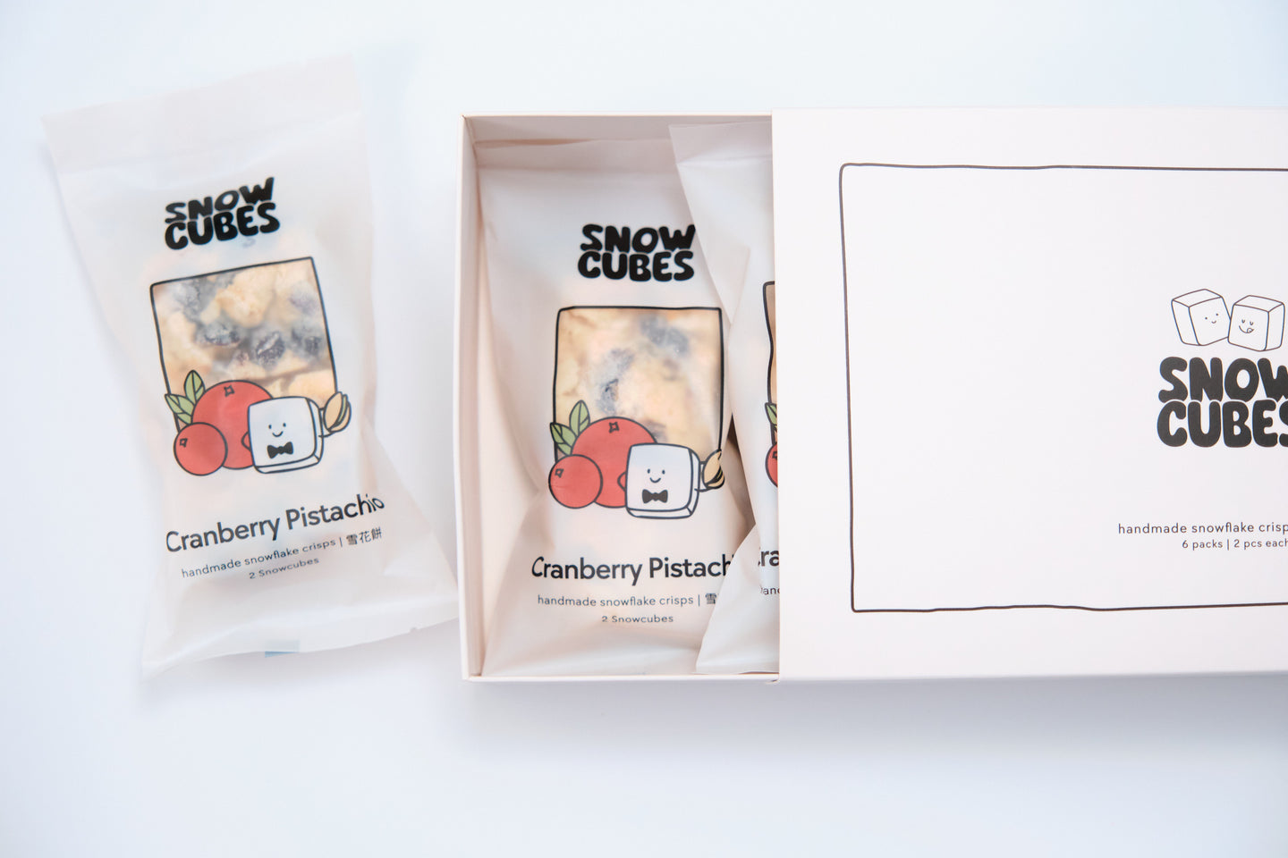Cranberry Pistachio Classic Snowcubes — handmade Taiwanese snowflake crisps with two sealed pouches, studded with dried cranberries and pistachios
