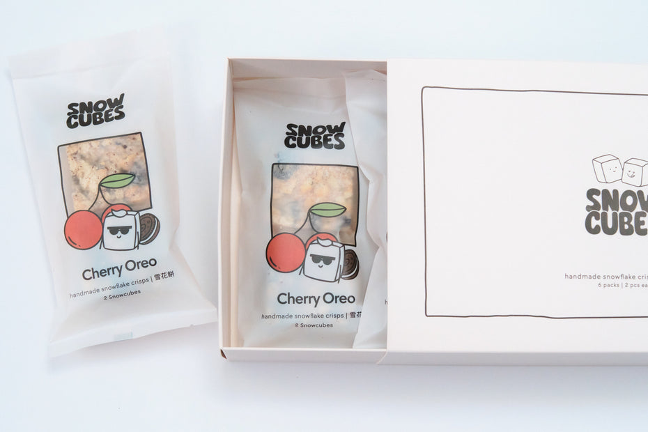 Cherry Oreo Snowcubes — handmade Taiwanese snowflake crisps with tart cherries and Oreo cookie pieces, boxed with two pouches