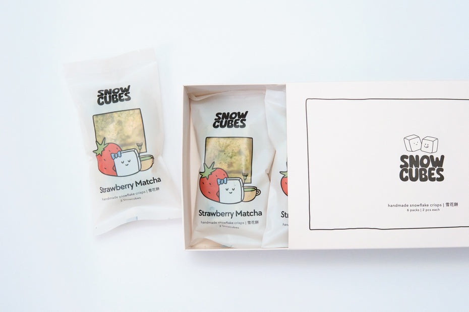 Strawberry Matcha Snowcubes — handmade Taiwanese snowflake crisps with freeze-dried strawberries and ceremonial-grade matcha, boxed with two pouches