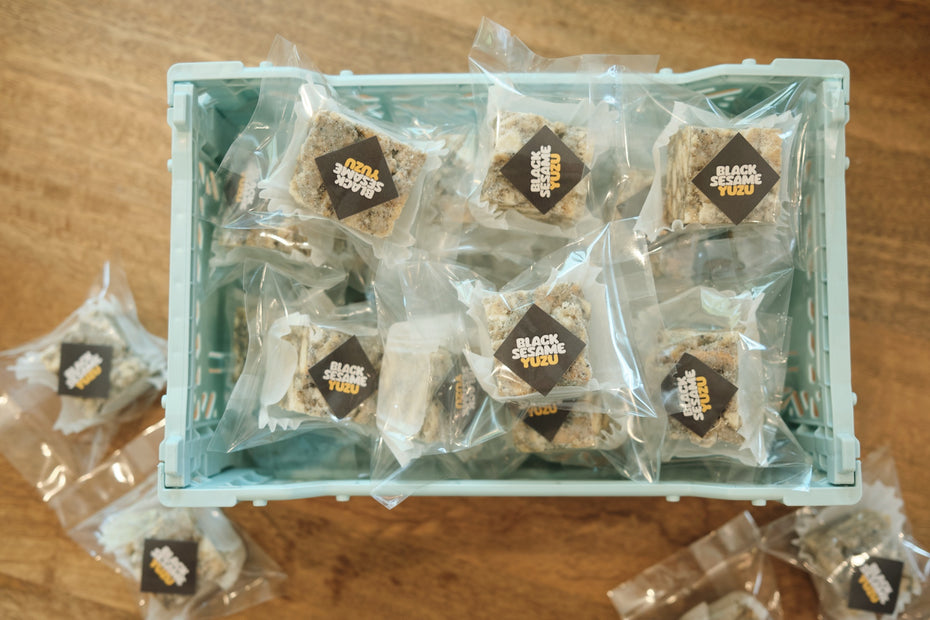 Black Sesame Yuzu Snowcubes — crate of individually wrapped cubes