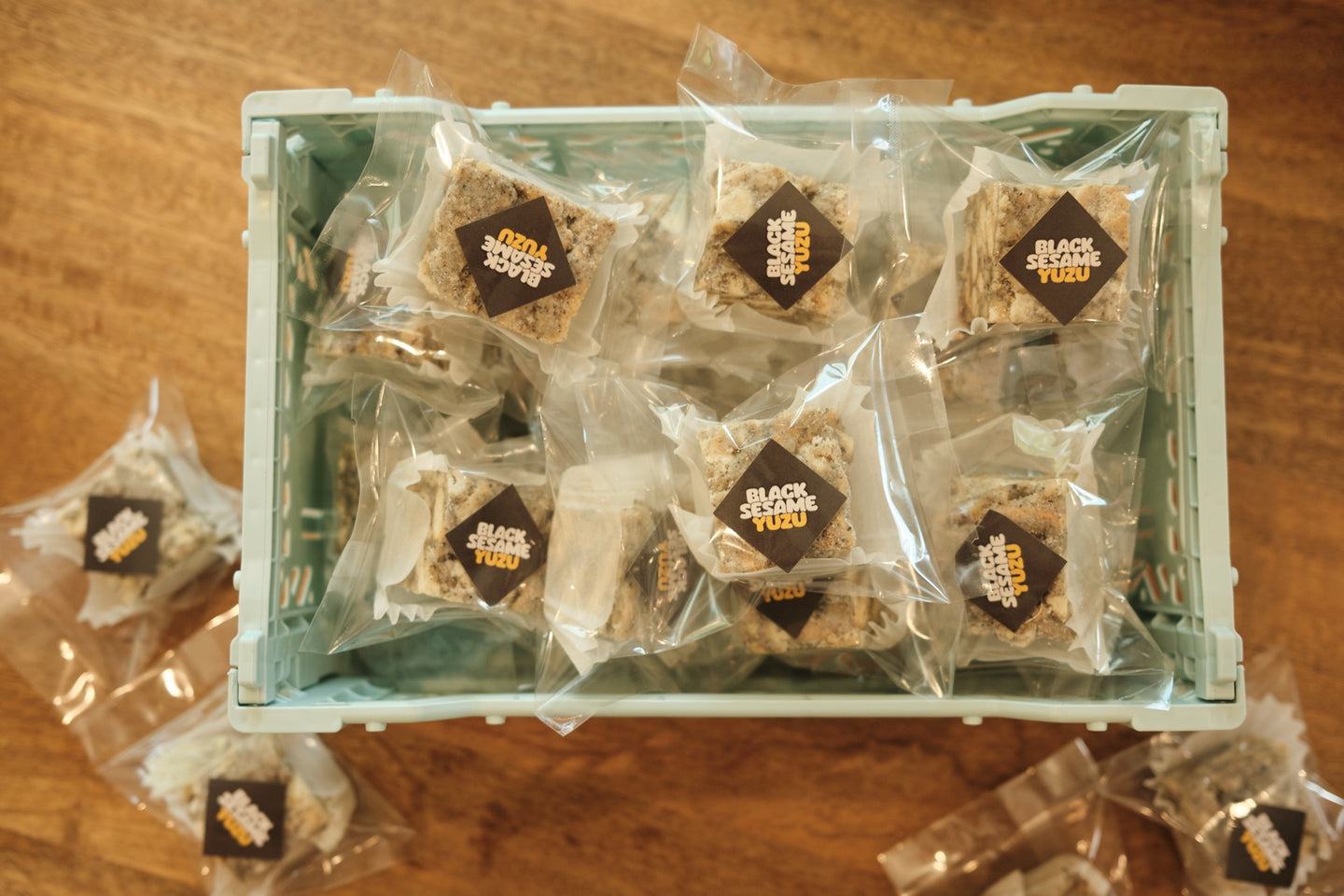 Black Sesame Yuzu Snowcubes — crate of individually wrapped cubes