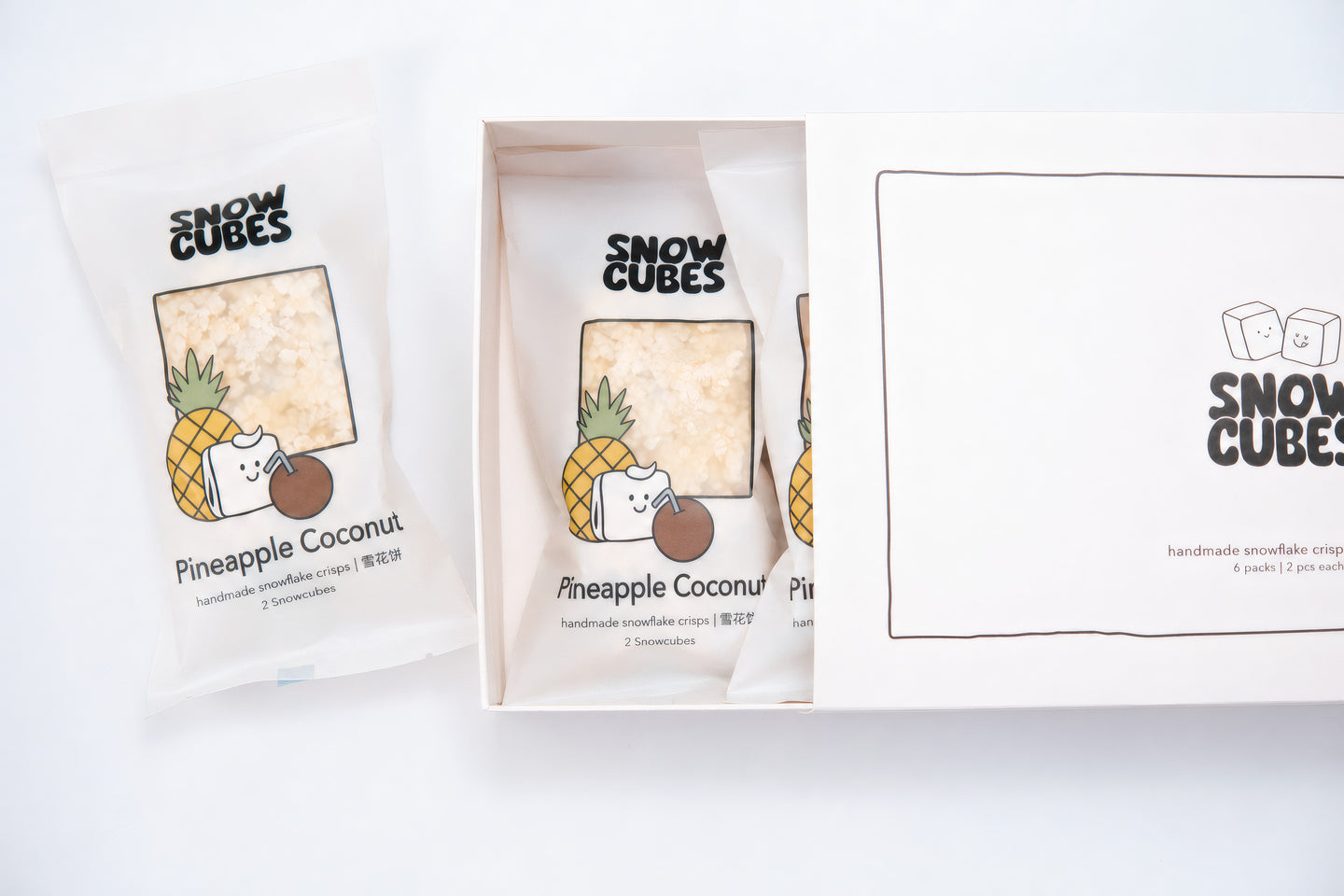 Pineapple Coconut Snowcubes — hero shot, box and pouches